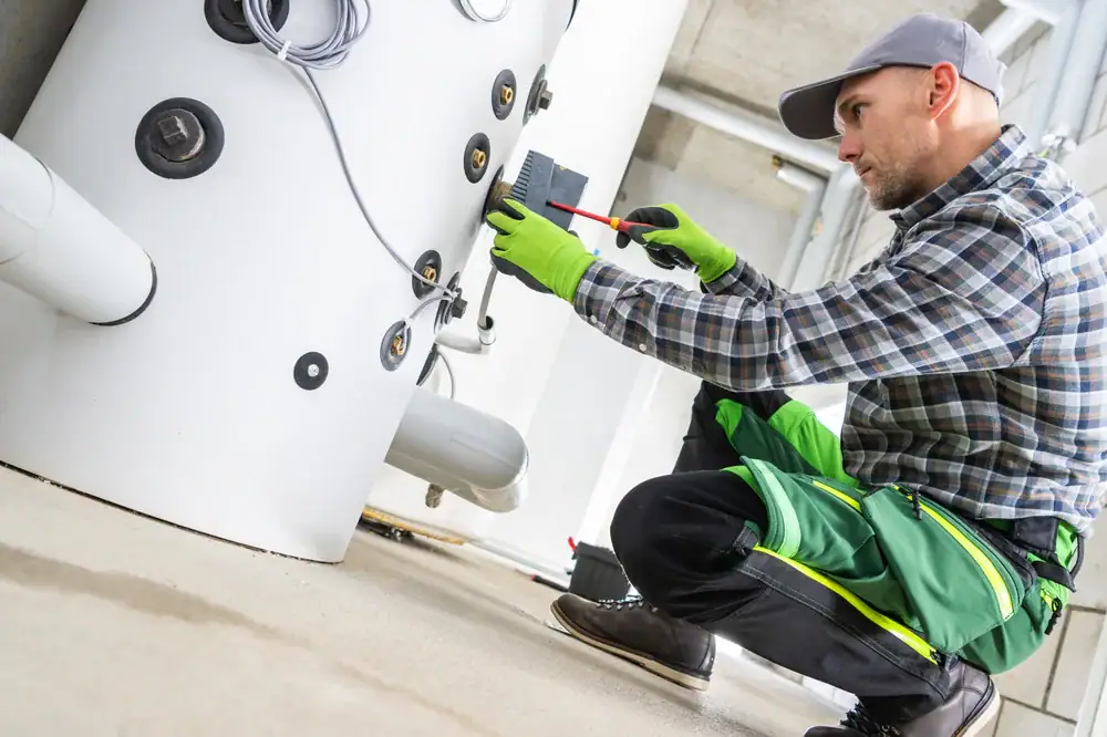 A Super Plumbing Heating technician carefully inspecting plumbing equipment in Bergen County, NJ, providing expert diagnostics and maintenance to ensure optimal performance